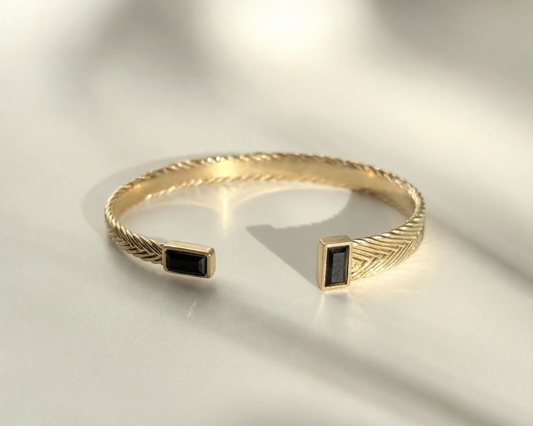 Hestia Cuff in gold vermeil with handwoven asymmetrical design by Kefi