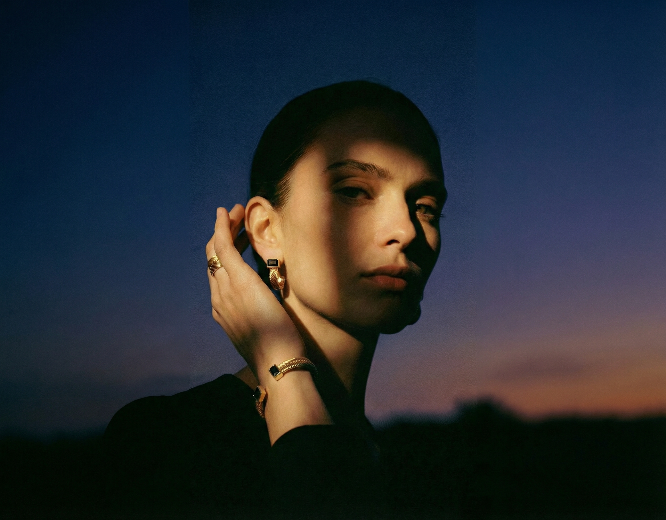 Model wearing Tall Woven Ring in gold vermeil, showcasing handwoven band and dimensional texture