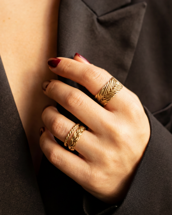 Model wearing Woven Ring in gold vermeil, showcasing handwoven band and dimensional texture